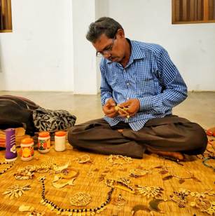 Odisha Tourists learn tribal jeweller making in Kala Bhoomi workshop